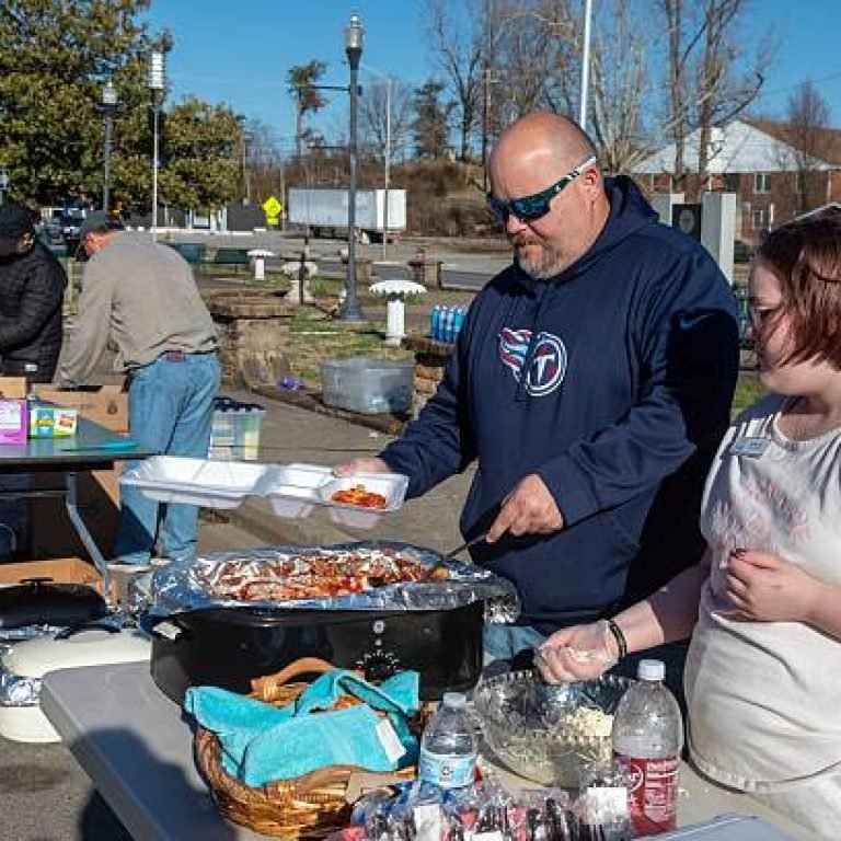 Dawson Springs, Kentucky, Volunteers from Tennessee serve meals to victims of the December 2021 tornado that devasted towns in western Kentucky. (Photo by: Jim West/UCG/Universal Images Group via Getty Images)